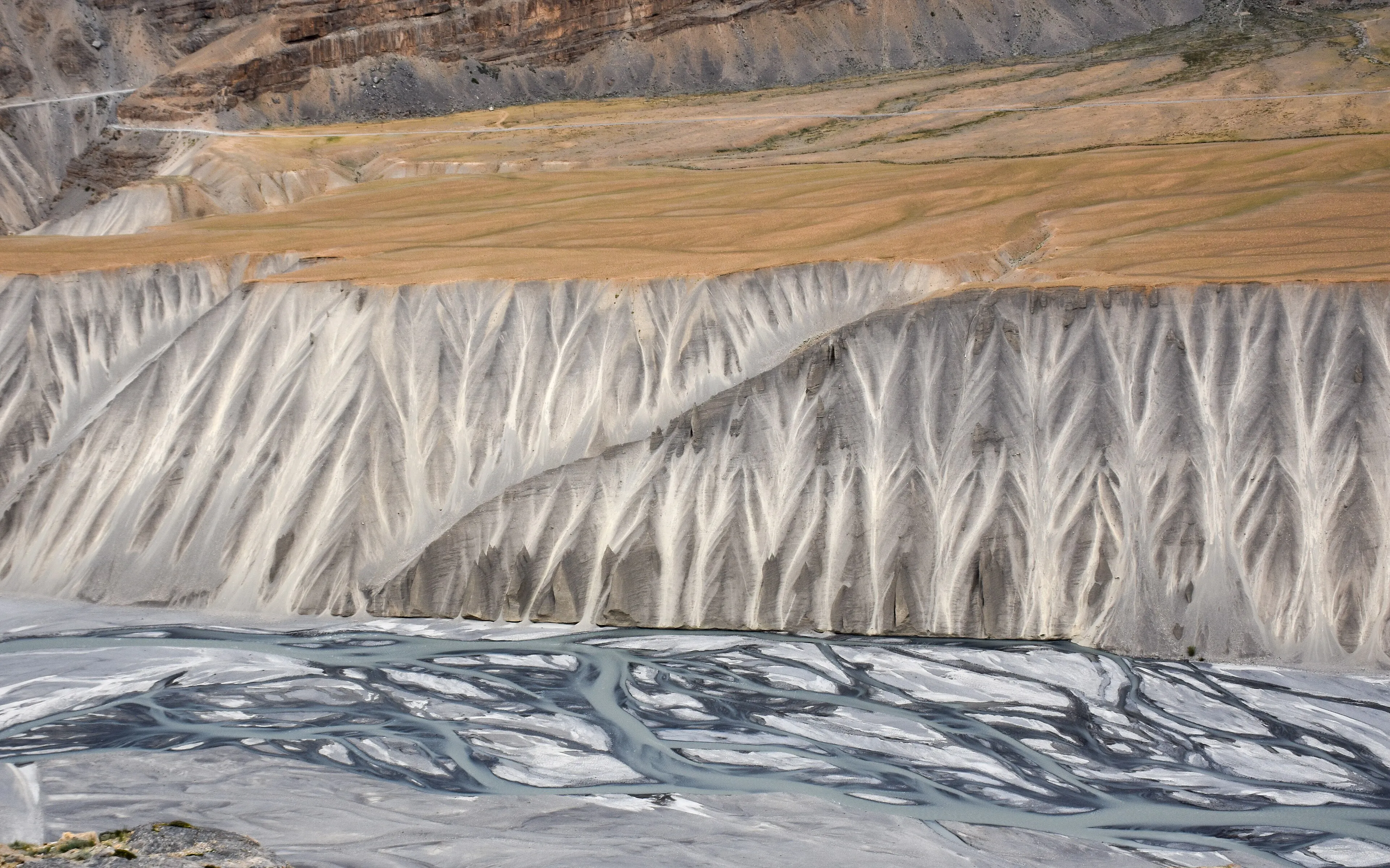 Prayer flags fluttering over the cold desert landscape of the Spiti Valley